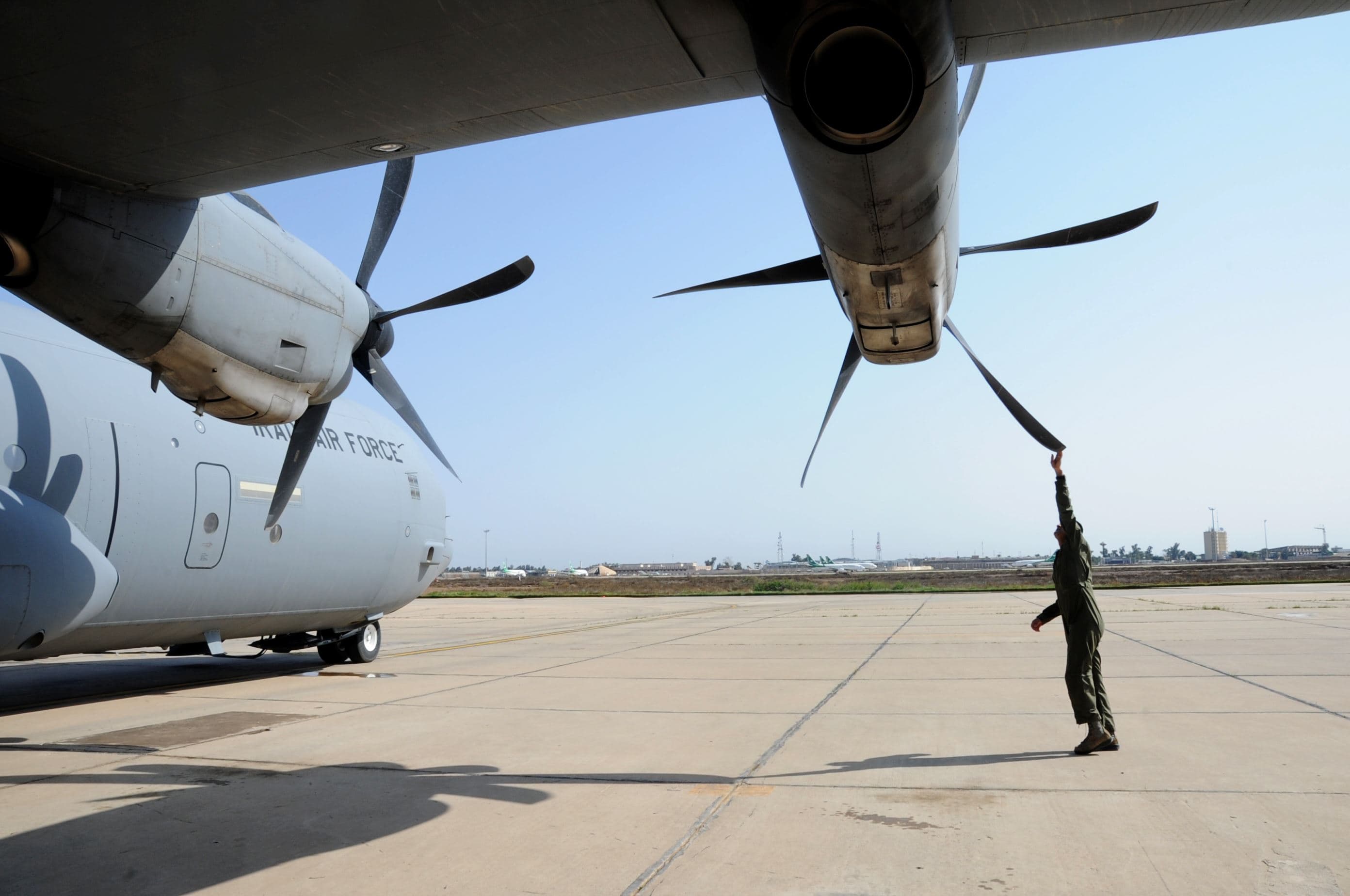 Iraqi air force a pilot, inspects a C-130J Super Hercules propeller at Martyr Muhammad Alaa Air Base in Baghdad, Iraq on March 20, 2017. Photo: US Air Force/Wikimedia Commons