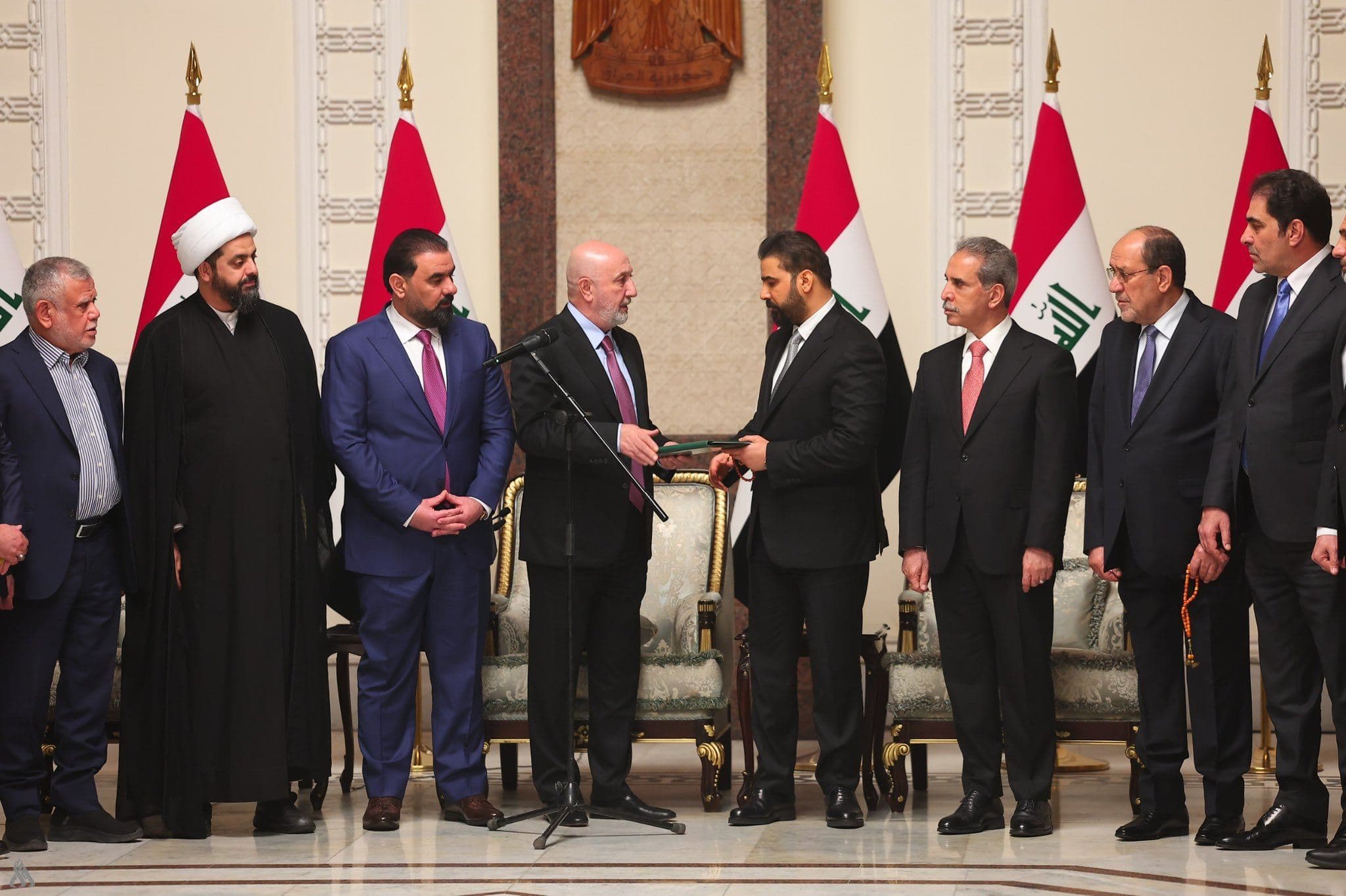 Iraqi President Nizar Amedi appoints Ali al-Zaidi, the candidate of the Shiite Coordination Framework, as prime minister-designate in Baghdad on April 27, 2026. Photo: Iraqi News Agency (INA)