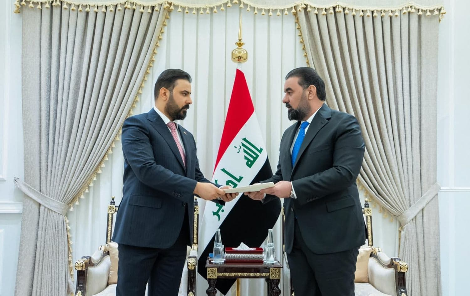  Iraqi Prime Minister-designate Ali al-Zaidi (left) submitted his government agenda to Parliament Speaker Haibat al-Halbousi on May 7, 2026. Photo: Iraqi parliament speaker's media office