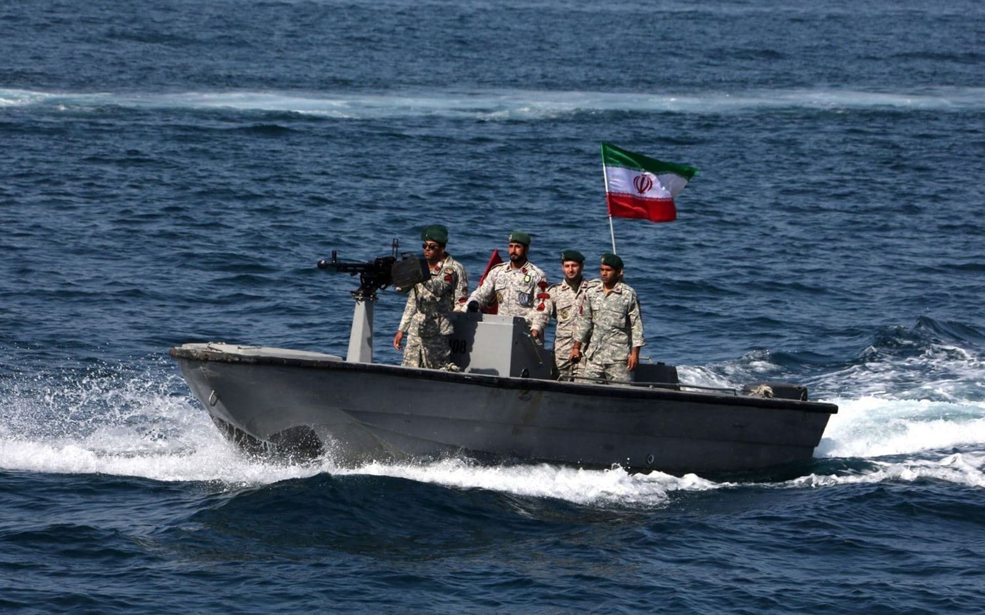 Iranian military personnel ride in a patrol boat in the Strait of Hormuz. File photo: AFP