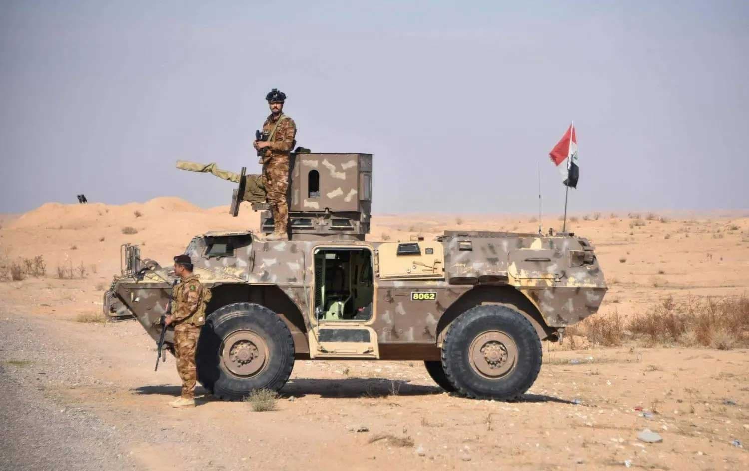 Iraqi soldiers and members of the Popular Mobilization Forces guard the border with Syria. File photo: AFP