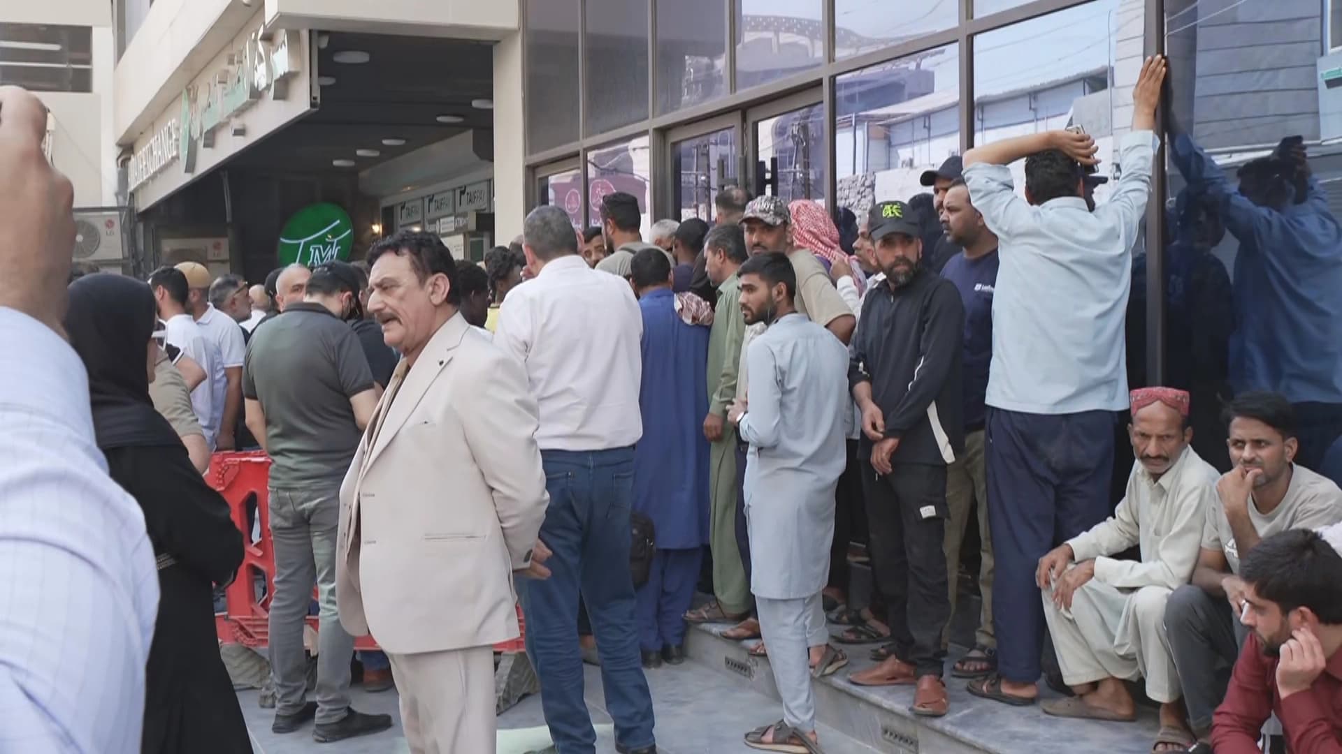 US-sanctioned Al-Taif Islamic Bank clients protest in Baghdad amid liquidity crisis