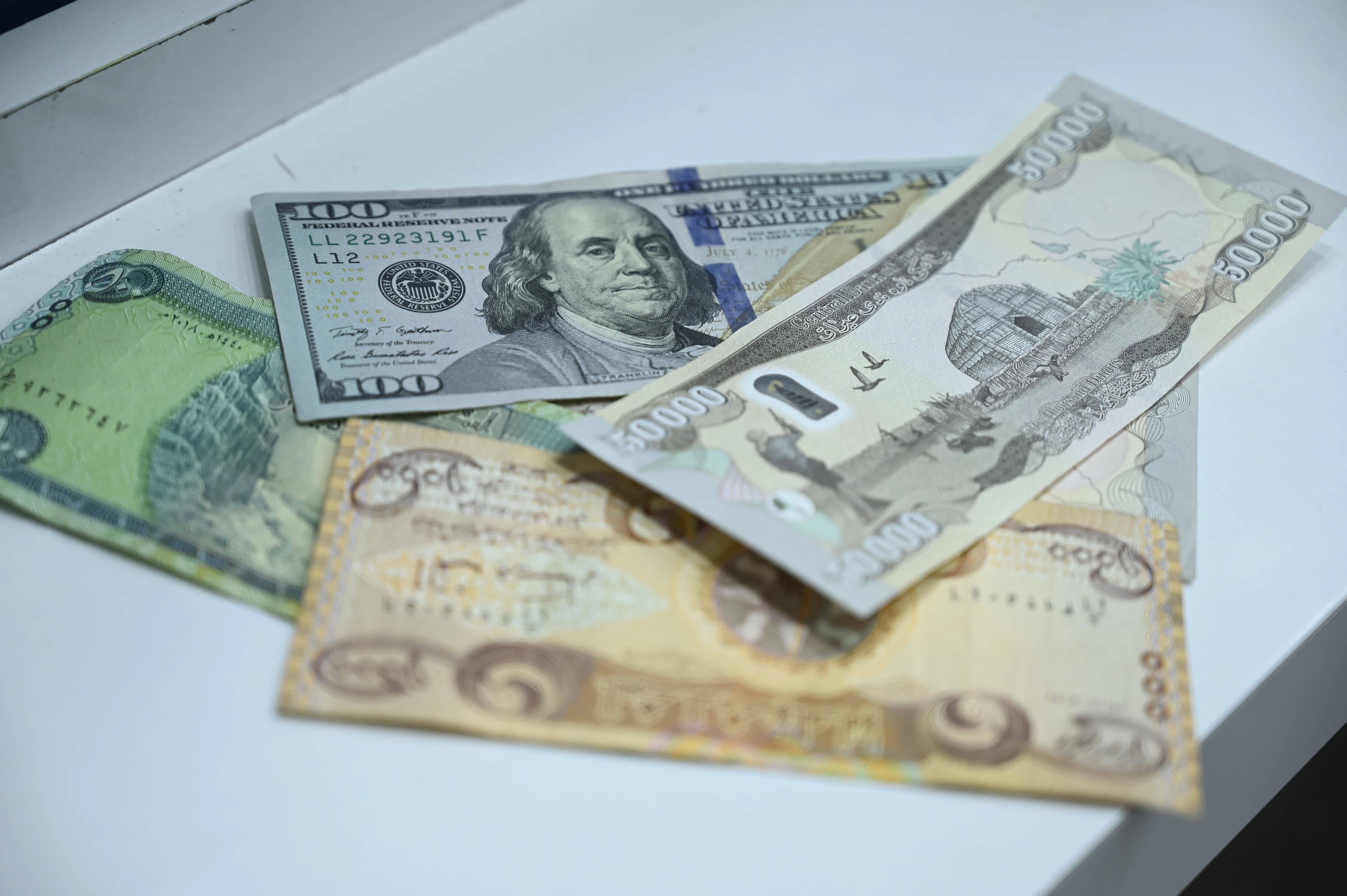 گۆڕینی بەهای دینار بەرامبەر بە دۆلار، مانگانە 25%ى کورتهێنانى عێراق کەم دەکاتەوە