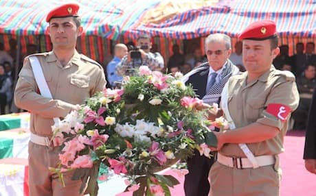 Governor of Kirkuk Najmaldin Karim participates in the reburial ceremony of the remains of 80 Anfal victims recently found in a mass grave, September 8, 2013. Photo: Kirkuk Gov.