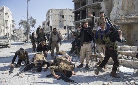 Free Syrian Army fighters celebrate in al-Bab in the Syrian province of Aleppo in February 2016. Photo: AA