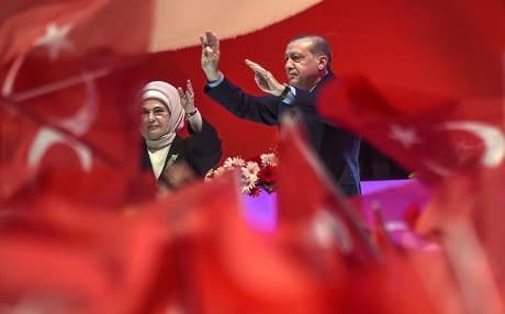 Turkish President Recep Tayyip Erdogan (R) and his wife Emine Erdogan (L) during a campaign rally of Turkey's president on Wednesday in a campaign rally for the "yes" vote in a constitutional referendum in Istanbul. Photo: AFP