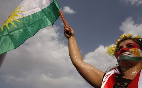 A Kurdish woman attends a campaign rally to support the referendum on the independence of the Kurdistan Region, on September 20, 2017 in Sulaimani. The referendum is scheduled for Monday, September 25, despite the opposition of the Iraqi government and neighboring countries such as Turkey and Iran, as well the international community. Photo: AFP/Shwan Mohammed
