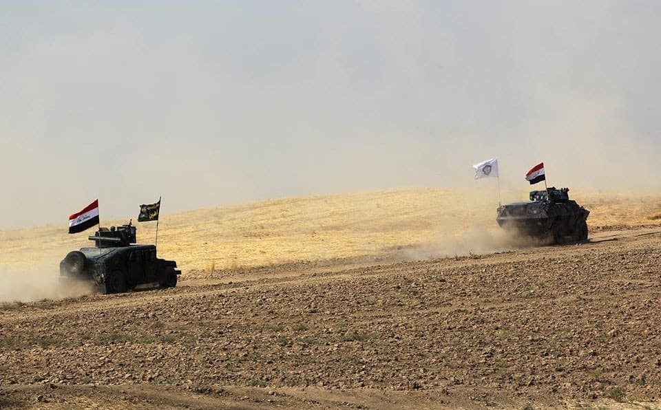 Iraqi forces advance on Fishabur on Thursday. Photo: Ahmad al-Rubaye/AFP