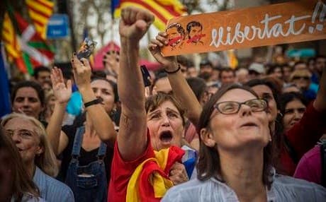 Pro-independence Catalans are cheering the regional parliament's declaration of secession from Spain, a country they don't regard as their own. (AP Photo/Santi Palacios, File)/ October 27, 2017