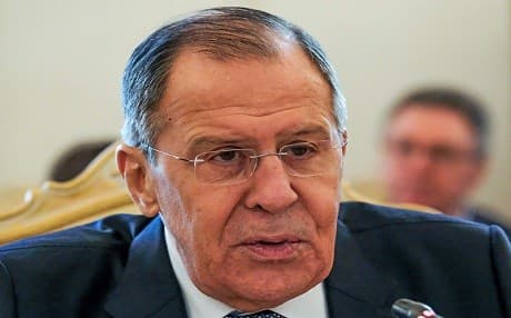 Russian Foreign Minister Sergei Lavrov speaks with his Tajik counterpart during their meeting in Moscow on April 9, 2018. Photo: Yuri Kadobnov | AFP