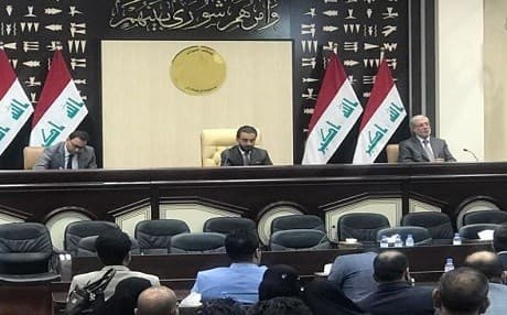 Iraq's Speaker of Parliament Mohammed al-Halbousi (center) presides over a session on parliament with first deputy Hassan Karim al-Kaabi (left) after Bashir Haddad of the KDP was voted in on September 16, 2018. Photo: Rudaw TV