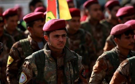 YPG fighters shown in this image from January 24, 2018, have vowed to fight a guerrilla-style struggle against Turkish-backed forces in Afrin Canton. File photo: Delil Souleiman | AFP
