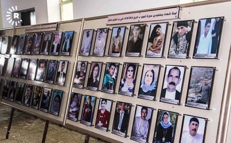 More than 6,000 Yezidi women and children were seized by ISIS and held captive when they swept across northern Iraq. A display of photographs pictured on March 15, 2019 in the village of Kocho pays tribute to those killed and missing. Photo: Mahdi Faraj/Rudaw