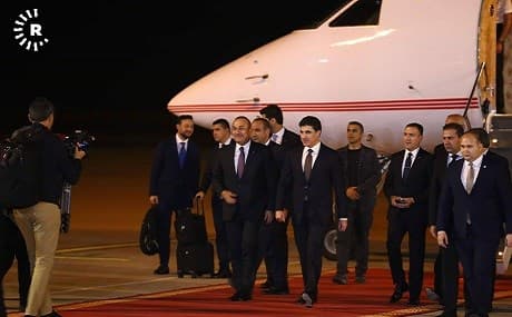 Turkish FM Mevlut Cavusoglu is greeted at Erbil International Airport by Kurdistan Region Prime Minister Nechirvan Barzani, April 28, 2019. Photo: Rudaw video