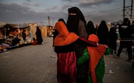 A veiled woman looks back at al-Hol camp in al-Hasaka governorate in northeastern Syria on February 17, 2019. File photo: Bulent Kilic | AFP
