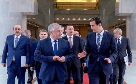 In this handout picture released by the Syrian Arab News Agency, Syrian President Bashar al-Assad (right) meets with Russia's Special Envoy on Syria Alexander Lavrentiev in Damascus on July 12, 2019. Photo: AFP/SANA