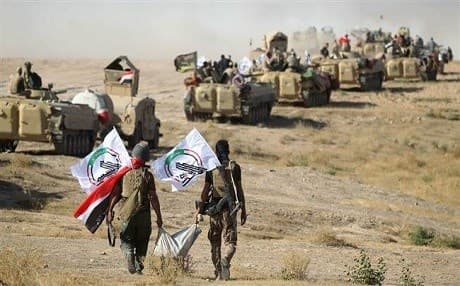 Hashd al-Shaabi fighters advancing towards Tal Afar, Nineveh province, in 2017. Photo: AFP