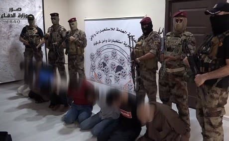 Iraqi troops parade seven alleged ISIS captives in this still taken from a video published by Iraq's defense ministry on Monday, August 13, 2019. Photo: Iraq defense ministry video / Facebook