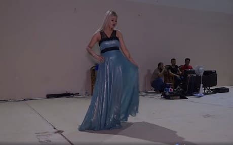A woman models a dress at the August 16 fashion show at Fallujah's Habanya resort. Photo: Irfaa Sawtak