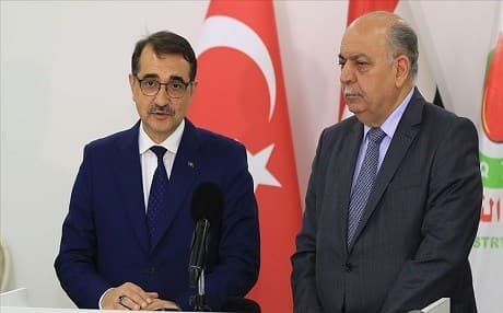 Turkish energy and natural resources minister Fatih Donmez and Iraqi oil minister Thamir Ghadhban during a press conference in Baghdad on Wednesday. Photo: AA