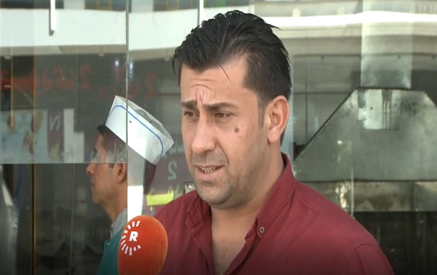 Owner of "Cheb Rebar," once known as "Hitler Restaurant," outside his restaurant in Duhok on September 10, 2019. Photo: Rudaw TV