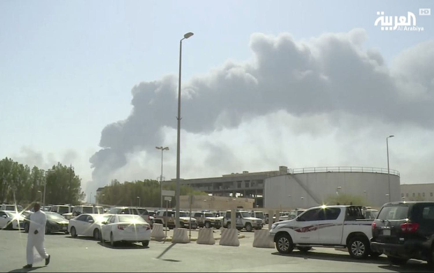 Smoke billows at the Abqaiq oil processing facility in Buqyaq, Saudi Arabia, September 14, 2019. Photo: Al-Arabiya / AP