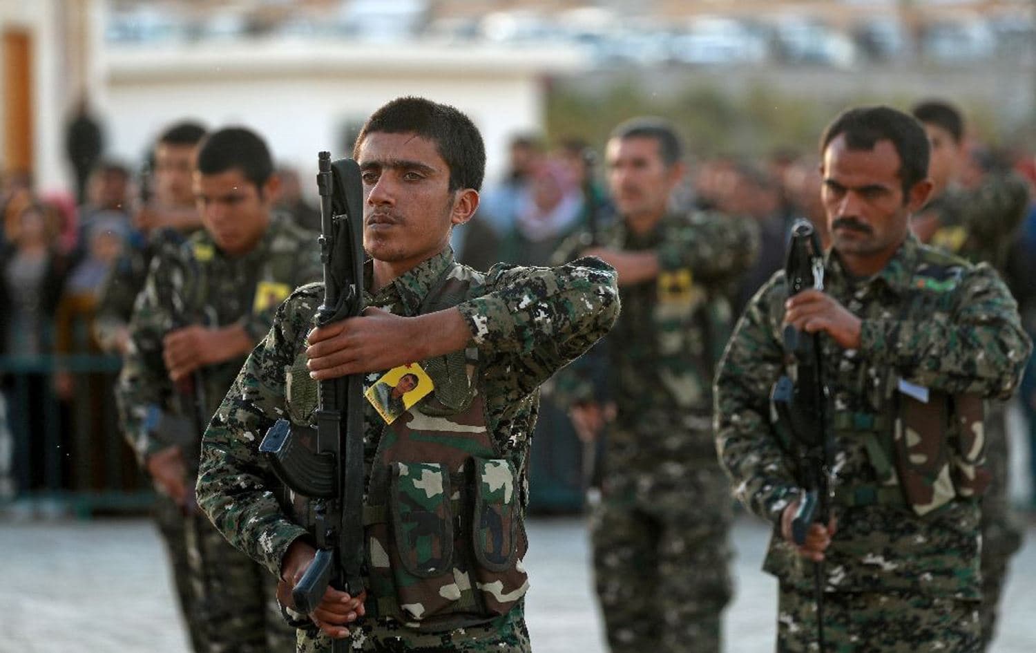 Syrian Democratic Forces (SDF) at a funeral in Kobane, Syria in November 2018. Photo: AFP/Delil Souleiman