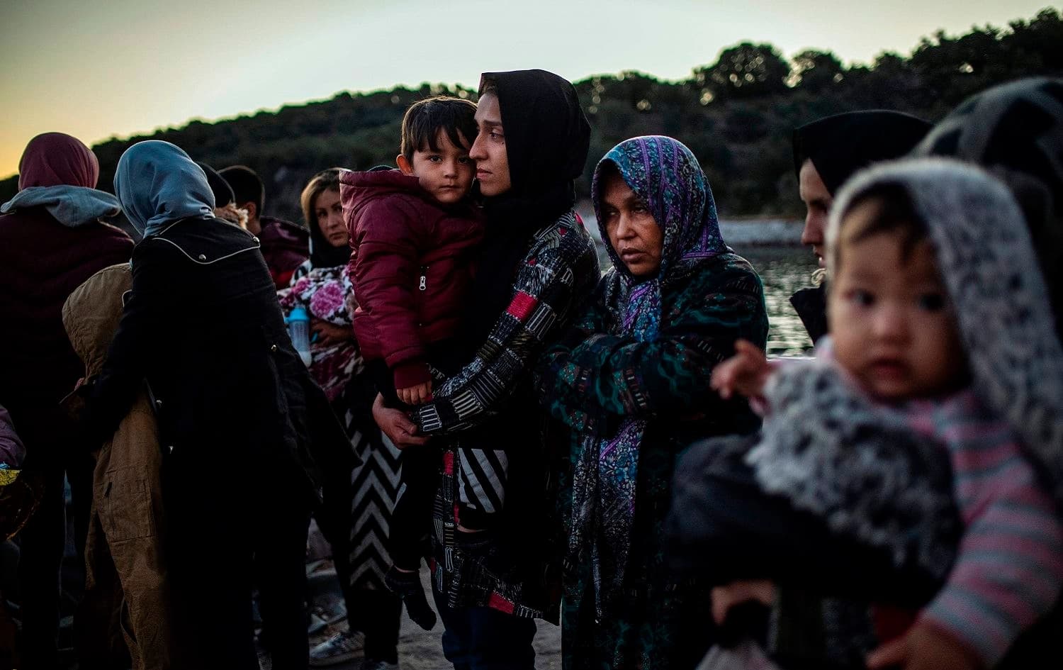 Afghan migrants arrive at the port of Skala Sikamias following a rescue operation by the Greek Coast Guard, Lesbos, Greece, September 29, 2019. Photo: Angelos Tzortzinis / AFP