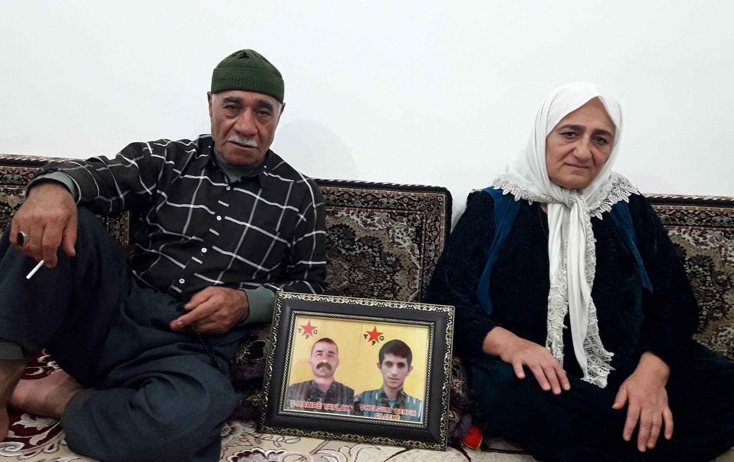 Mam Tofiq and Daya Zainab, whose son Hama Amir Amiri was killed in October 2015 fighting the Islamic State (ISIS) in Syria's Kobane, speak to Rudaw at their home in Degolan, Iranian Kurdistan. Photo: Jabar Dastbaz / Rudaw