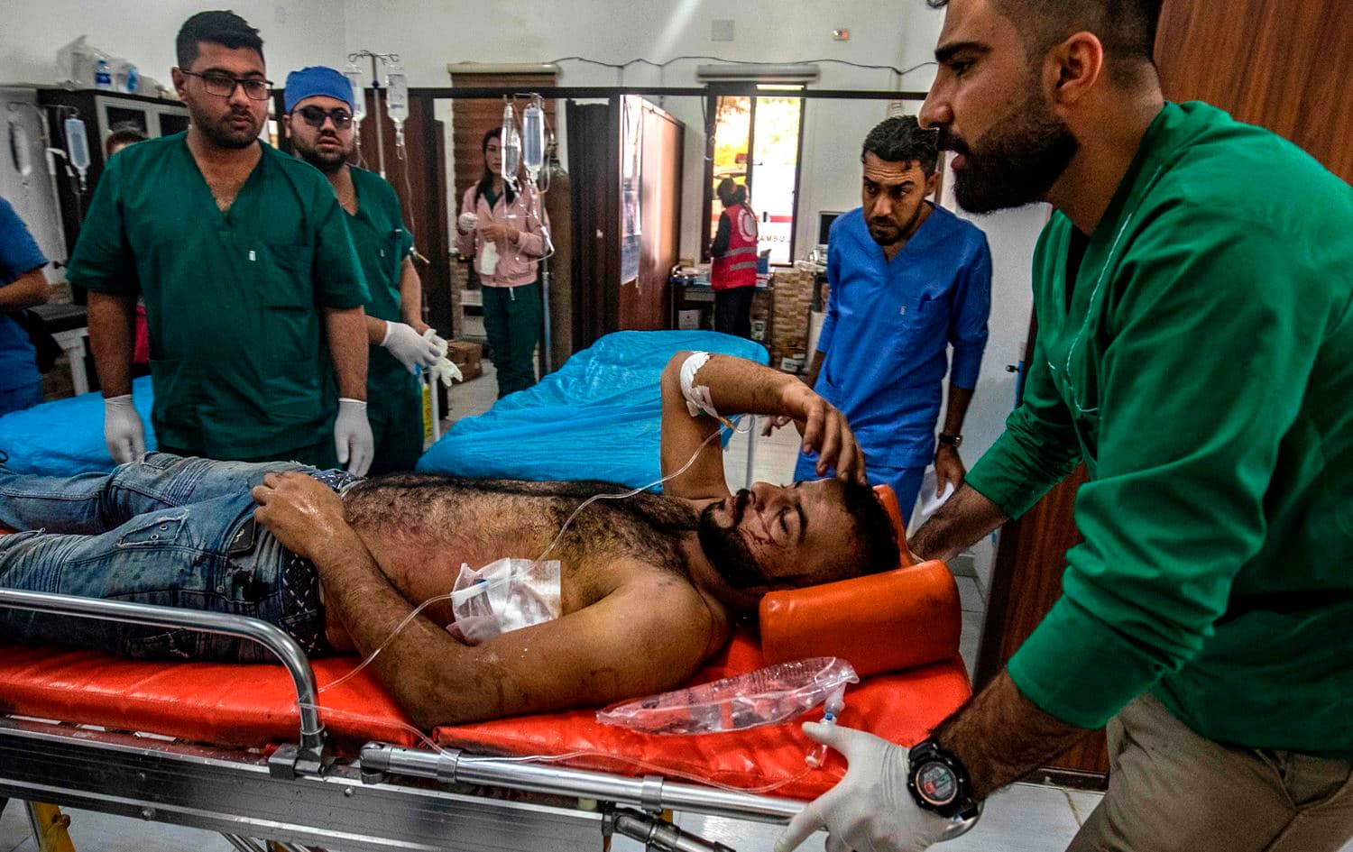 Syrians receive treatment at a hospital in Tal Tamr, near the Syrian Kurdish town of Ras al-Ain, October 18, 2019. Photo: Delil Souleiman/AFP