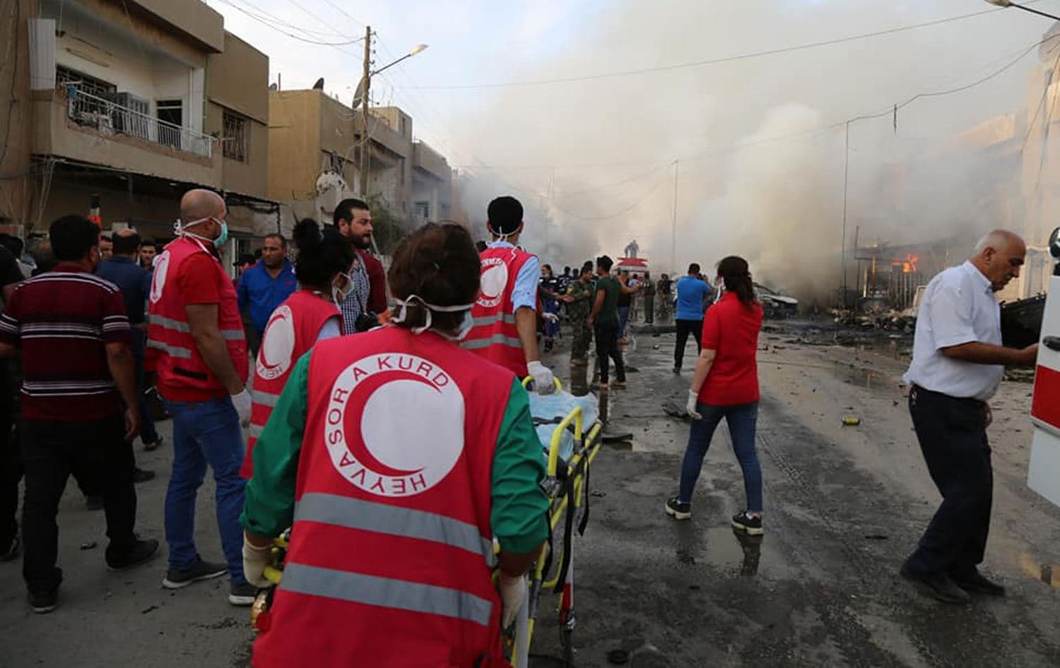 Staff of the Kurdish Red Crescent respond to a car bombing in Qamishli, northern Syria on October 11, 2019. Photo: Kurdish Red Crescent