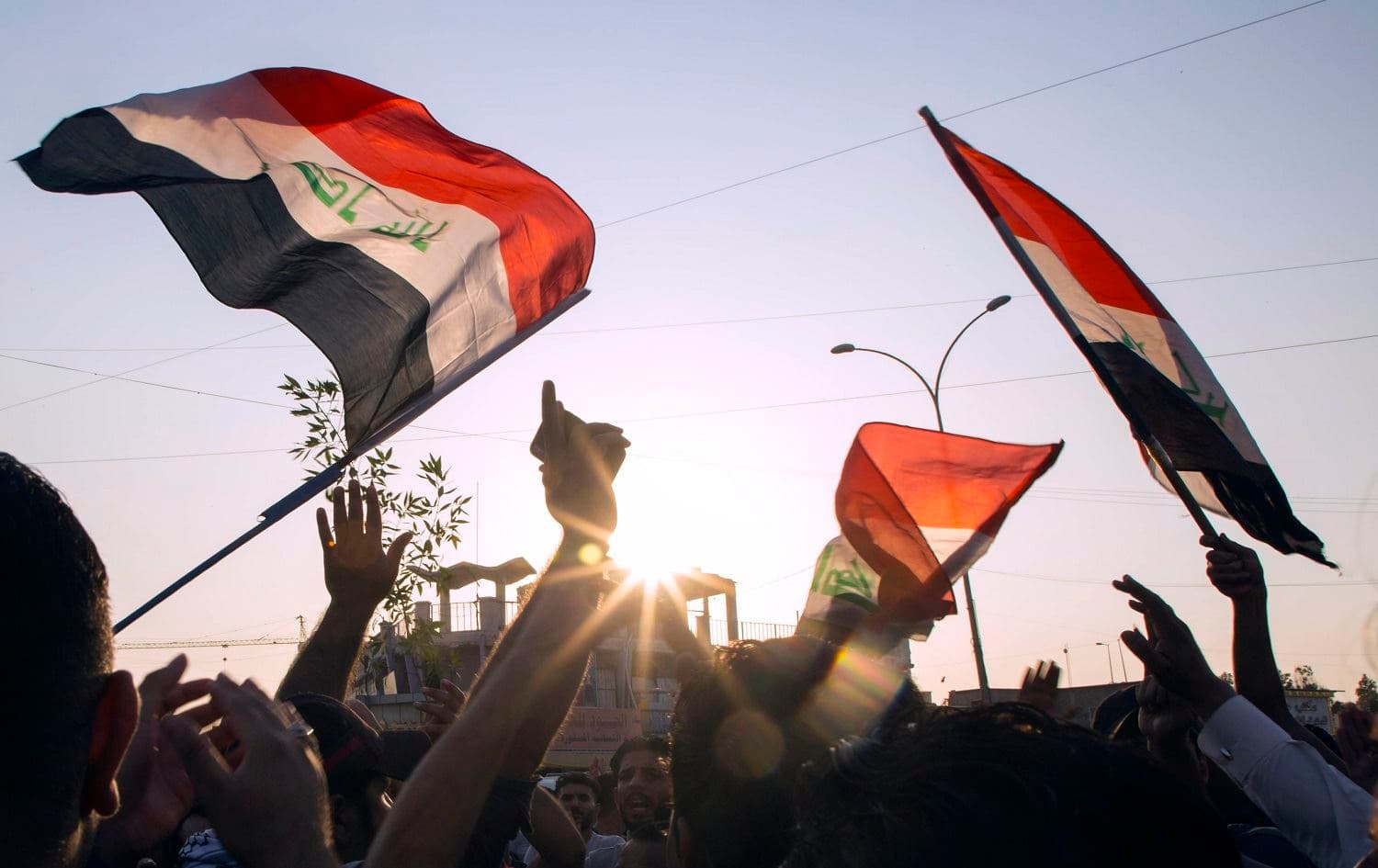 Iraqis demonstrate outside the Basra Governorate's building on November 11, 2019 in the southern city of Basra.Photo: Hussein Faleh/AFP