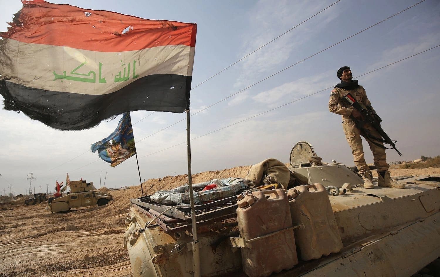 Iraqi forces near the Syrian border after recapturing the border town of Qaim, west of Anbar, from the Islamic State (ISIS), November 4, 2017. File photo: Ahmad al-Rubaye / AFP