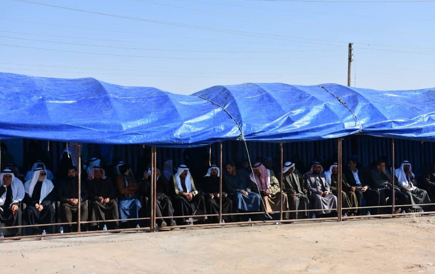 Local leaders in Deir ez-Zor attend a meeting with NES officials. Photo: NES social media