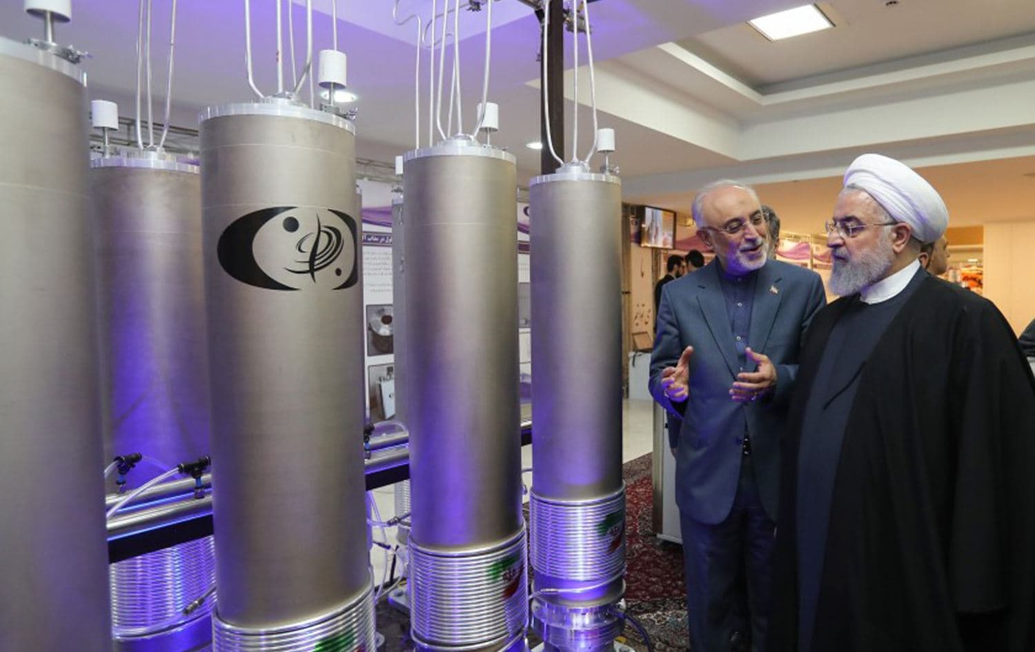 Iranian President Hassan Rouhani, right, listens to the head of Iran’s nuclear technology organization, Ali Akbar Salehi.Photo: AFP