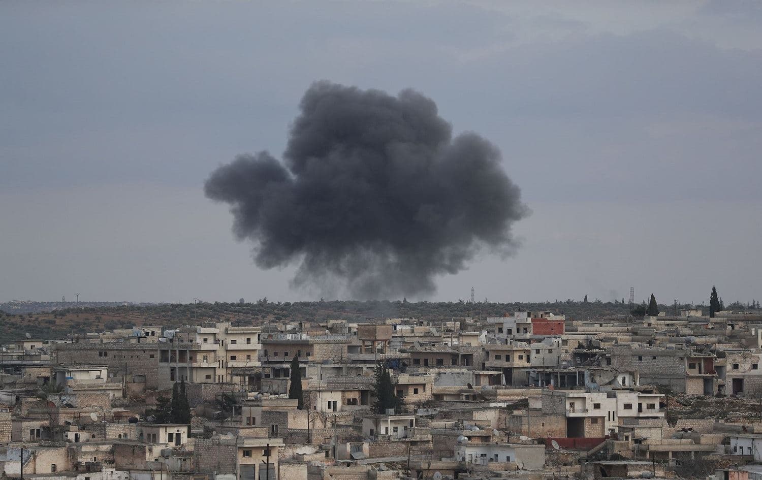 Smoke billows following reported bombardment by Syrian regime forces on the town of Kafr Ruma on the outskirts of Maaret al-Numan on January 27, 2020. Photo: Omar Haj Kadour/AFP