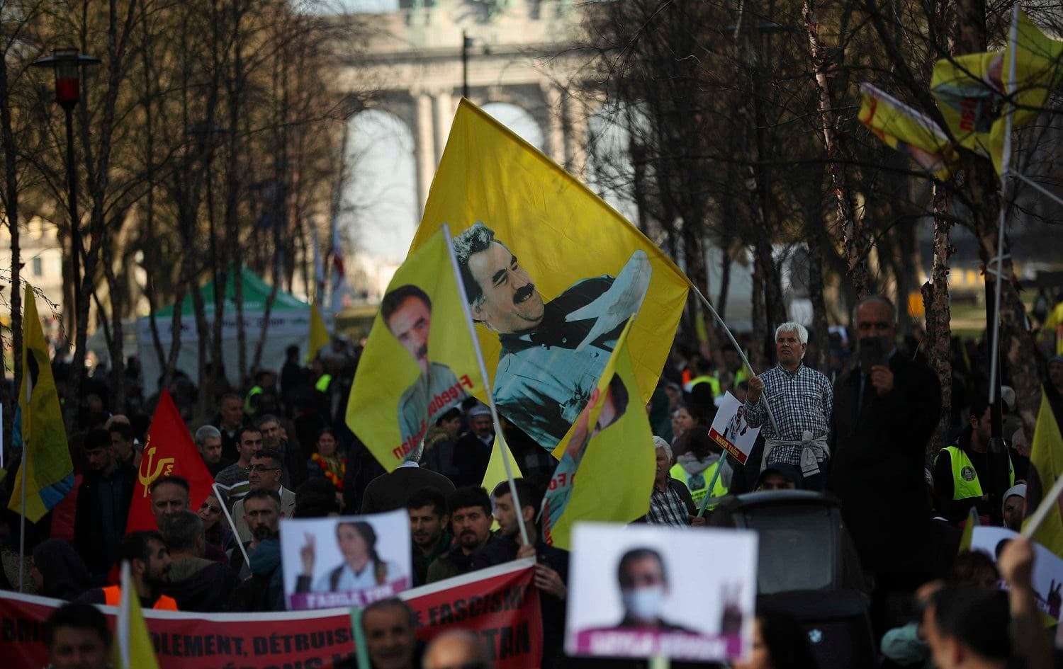 Pro-Kurdish people wave flags with the face of jailed PKK leader Abdullah Ocalan during a protest demanding his freedom in Brussels, February 27, 2019. File photo: Francisco Seco / AP
