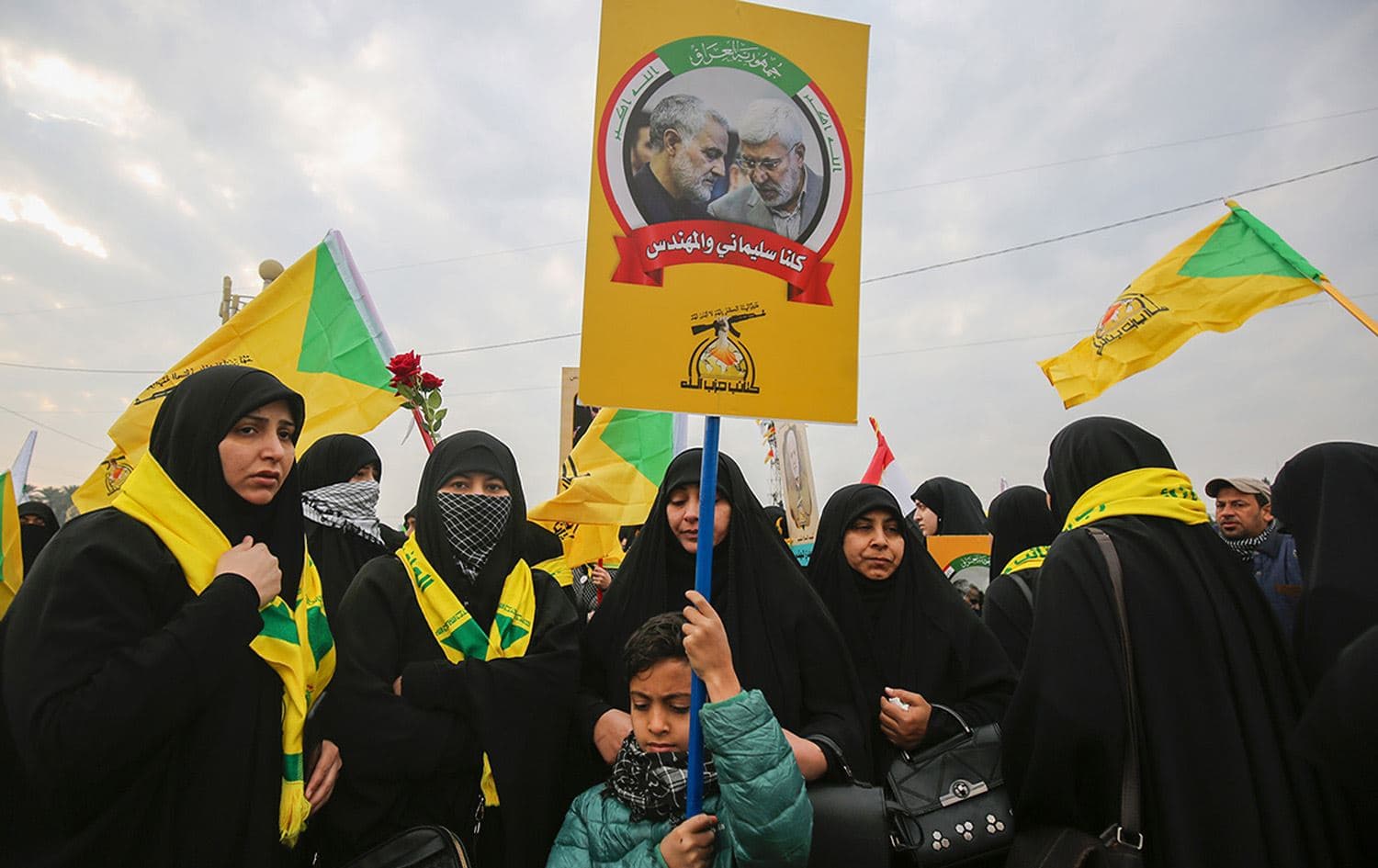 Hashd al-Shaabi supporters mourn the death of Abu Mahdi al-Muhandis and Qassem Soleimani. Photo via Ahmad al-Rubaye / AFP