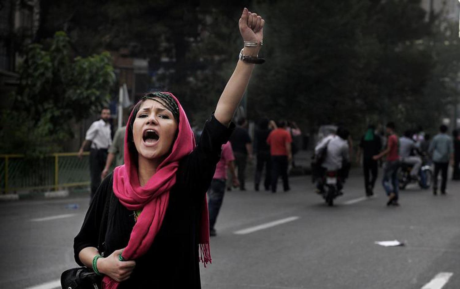 A female protester shouts slogans during an anti-government demonstration in Tehran, Iran, Hune 13, 2009. File photo: Olivier Laban-Mattei / AFP