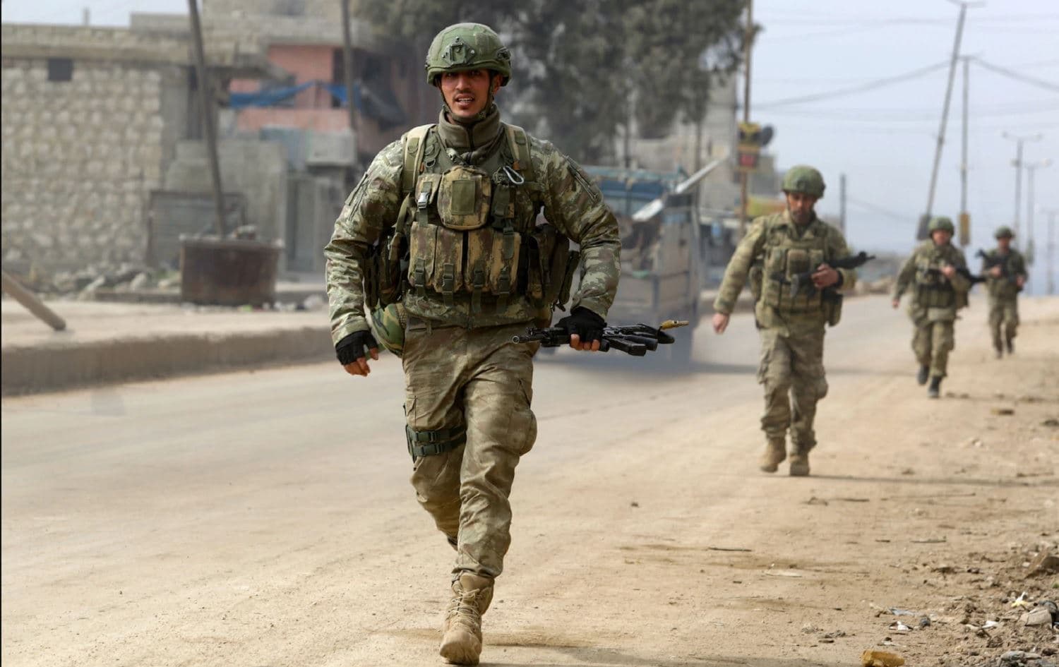 Turkish troops patrol a town in northwest Syria on February 19, 2020. Photo: Aref Tammawi/AFP