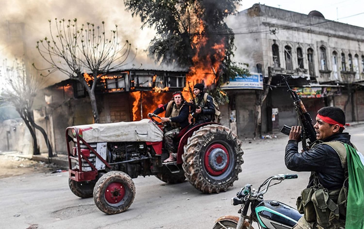 Turkish-backed Syrian proxy fighters loot businesses in Afrin, March 24, 2020. File photo: AFP