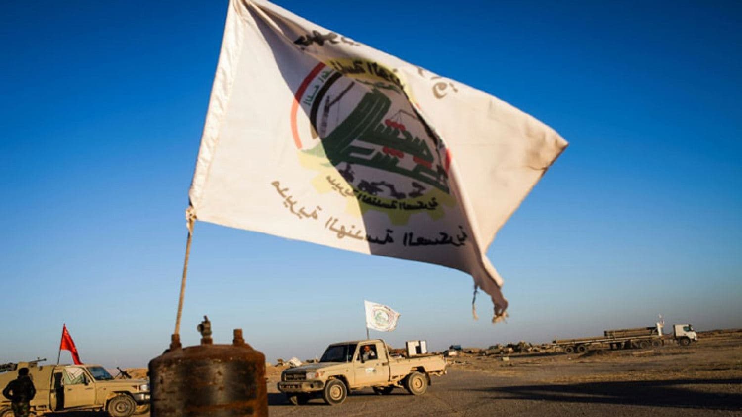 File photo of members of Iraq's Hashd al-Shaabi on the tarmac at Tal Afar airport. Photo: Achilleas Zavallis/AFP