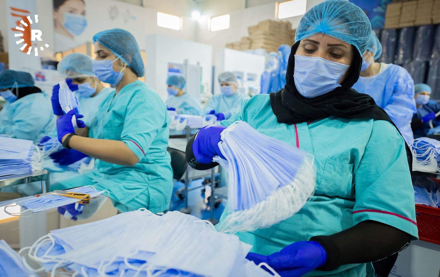 Workers at a factory in Erbil produce personal protective equipment on May 31, 2020. Photo: Bilind T. Abdullah / Rudaw