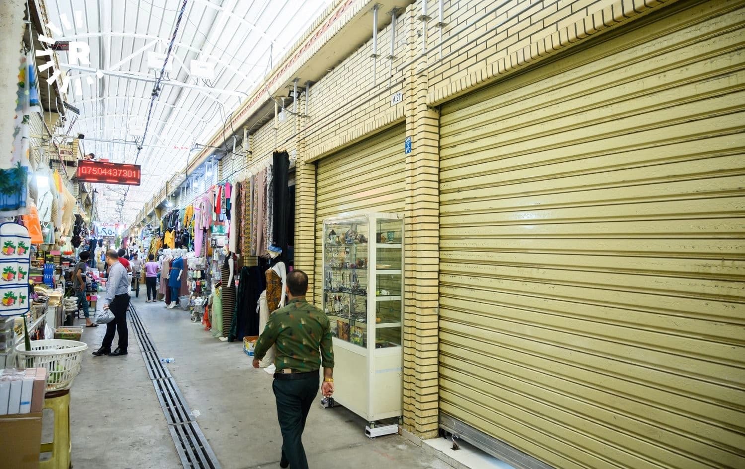 A man walks through Erbil's partially closed Langa market on June 27, 2020. Photo: Bilind T. Abdullah/Rudaw