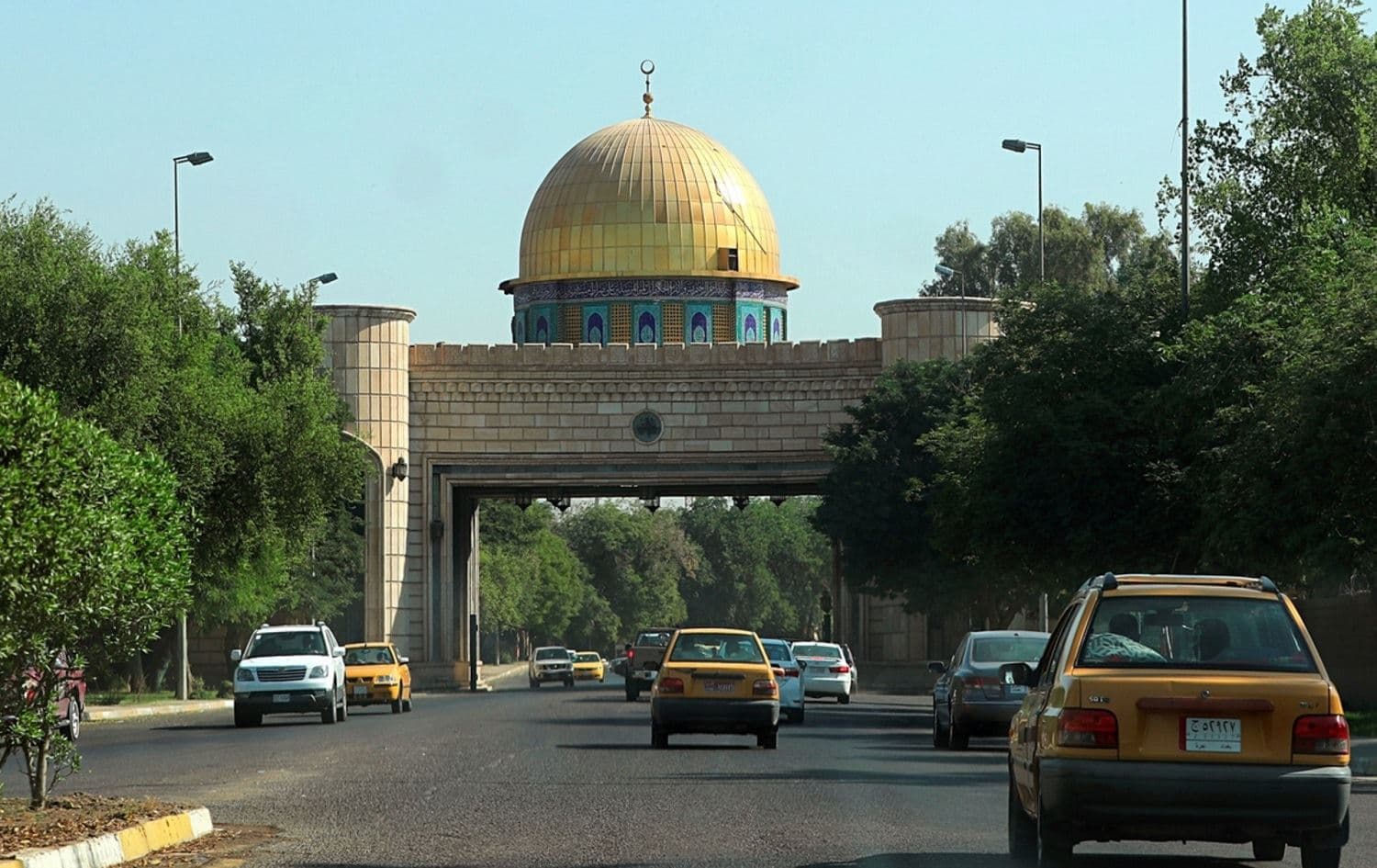 Vehicles move through Baghdad's Green Zone on September 24, 2019. Photo: Hadi Mizban / AP