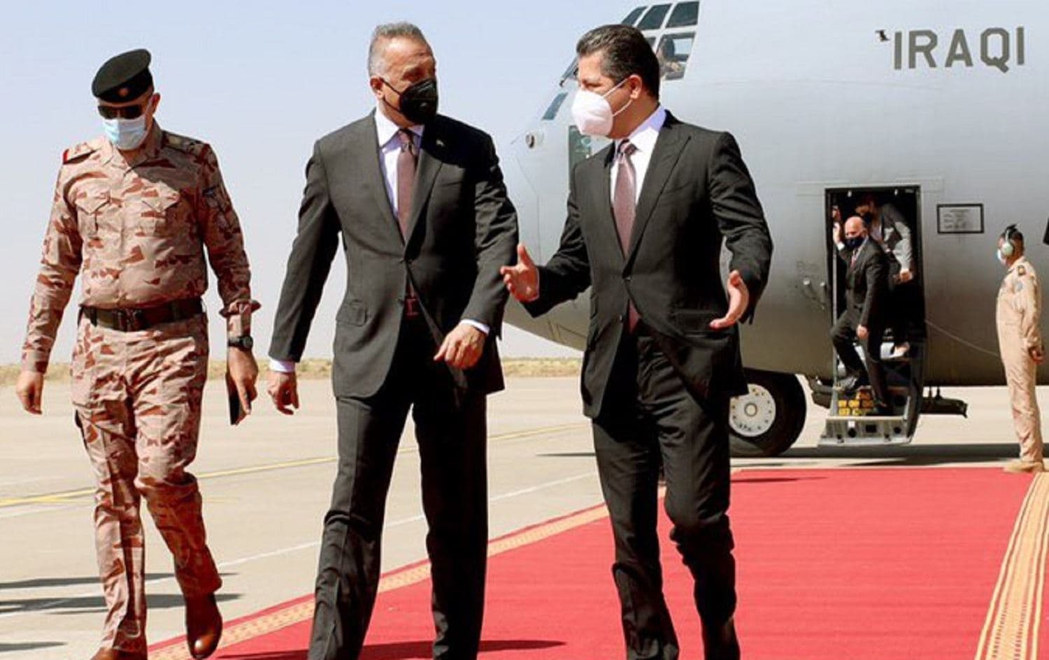 Iraqi prime minister Mustafa al-Kadhimi (centre) is met by Prime Minister of the Kurdistan Region Masrour Barzani at Erbil International Airport on September 10, 2020. Photo: Iraqi PMO on Twitter