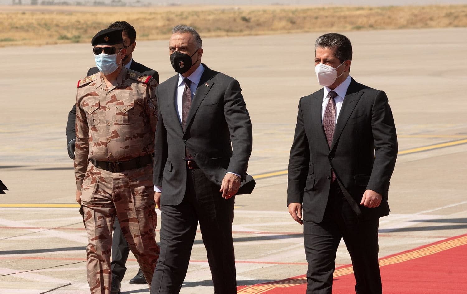 Iraqi Prime Minister Mustafa al-Kadhimi (centre) arrived at Erbil airport on September 10, 2020, where he was greeted by Kurdistan Region Prime Minister Masrour Barzani (right). Photo: Bilind T. Abdullah/Rudaw