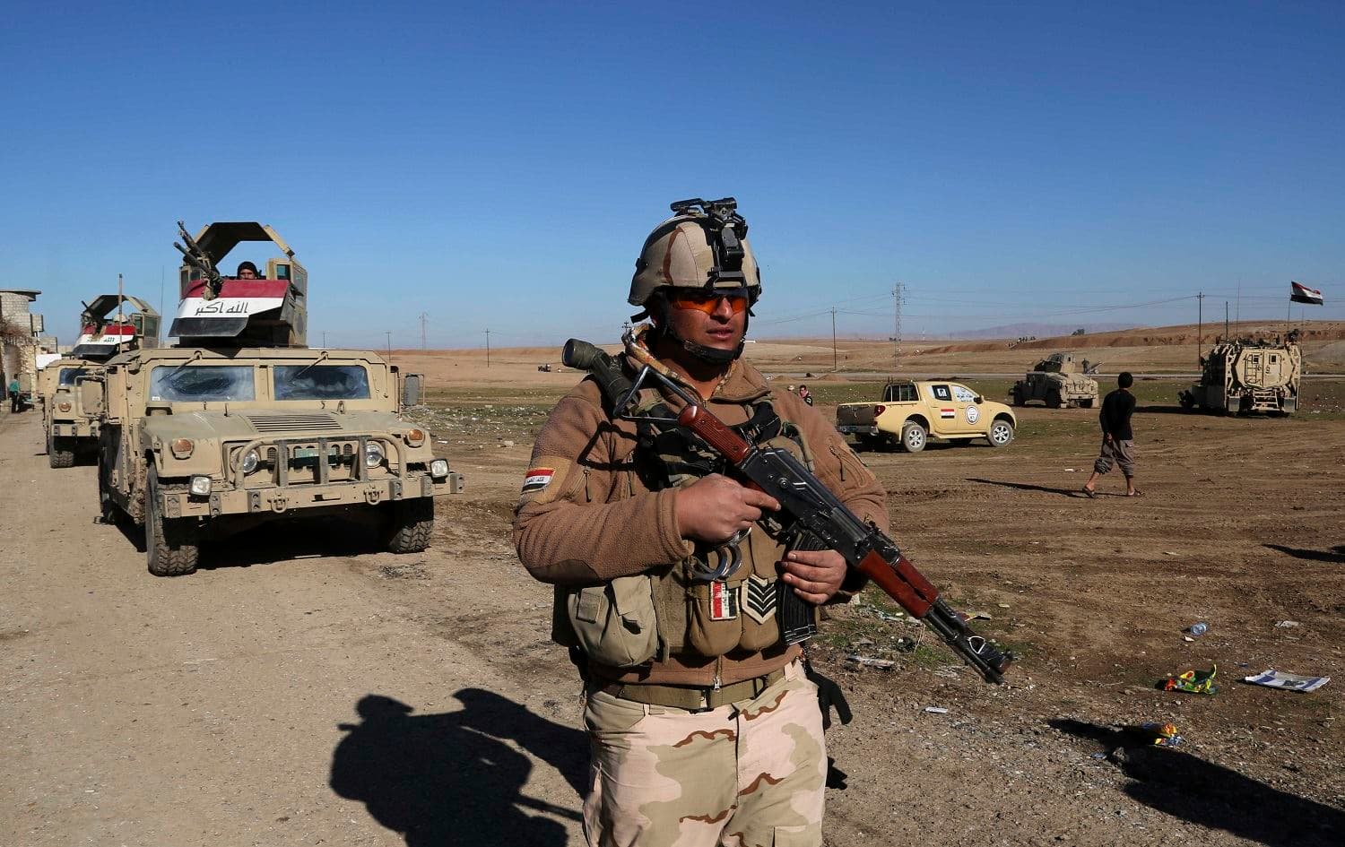 Iraqi army soldiers redeployed in the fight against the Islamic State (ISIS) in 2017. The prime minister ordered forces to tighten security on the border with Syria. File photo: Khalid Mohammed/AP