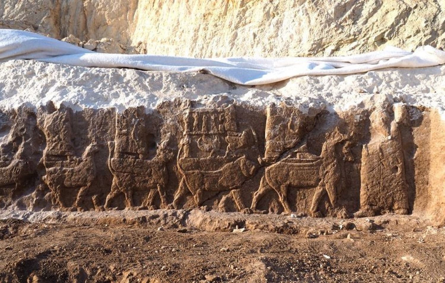 An Assyrian rock relief discovered by the Kurdish-Italian Faida Archaeological Project (KIFAP) in Faida, 20 kilometres south of Duhok, in autumn 2019. Photo via University of Udine press release