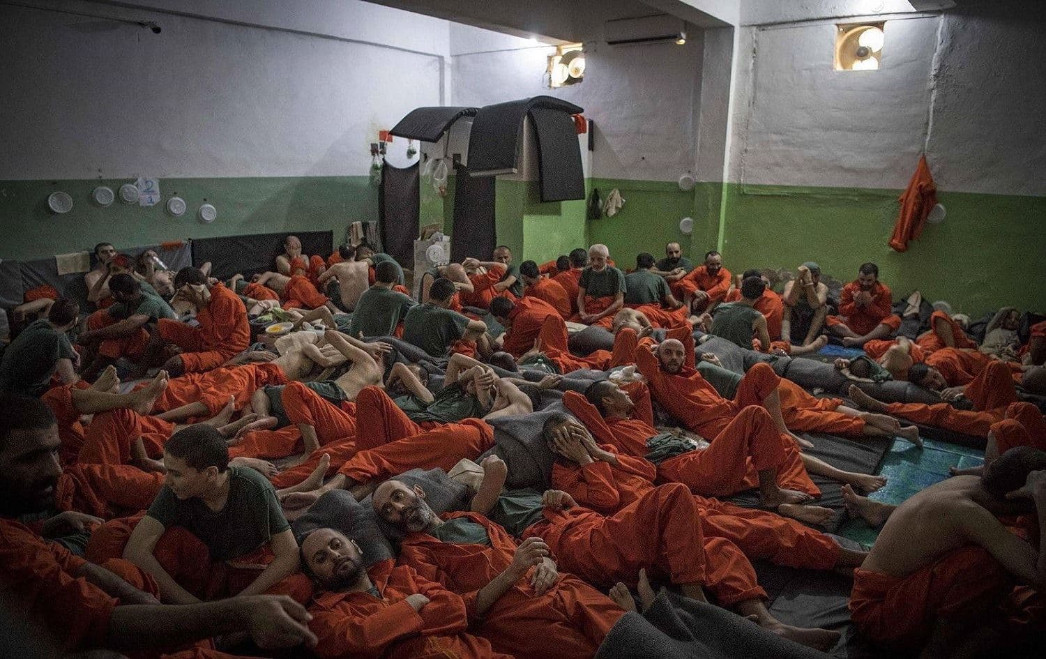 Suspected members of the Islamic State (ISIS) in a prison in northeast Syria, known to Kurds as Rojava. Photo: AFP
